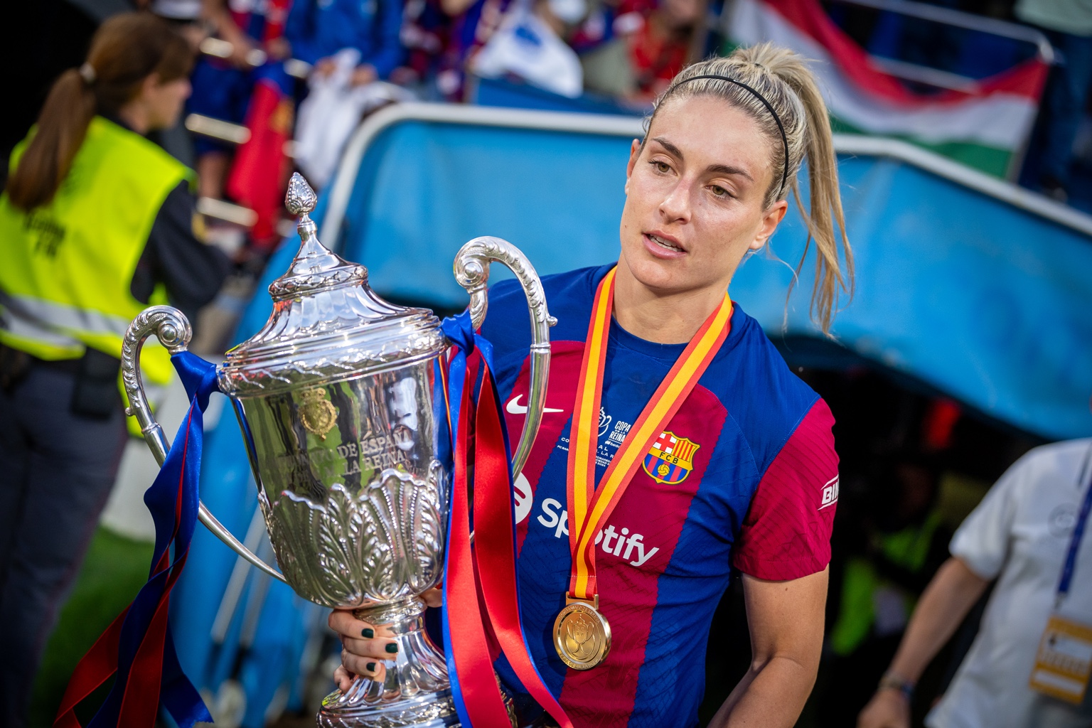 Soccer athlete holding a trophy